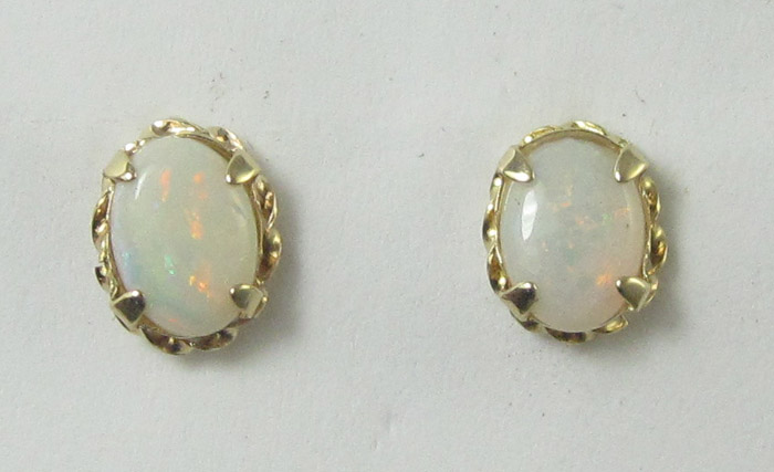 Appraisal: PAIR OF OPAL AND FOURTEEN KARAT GOLD EARRINGS each set