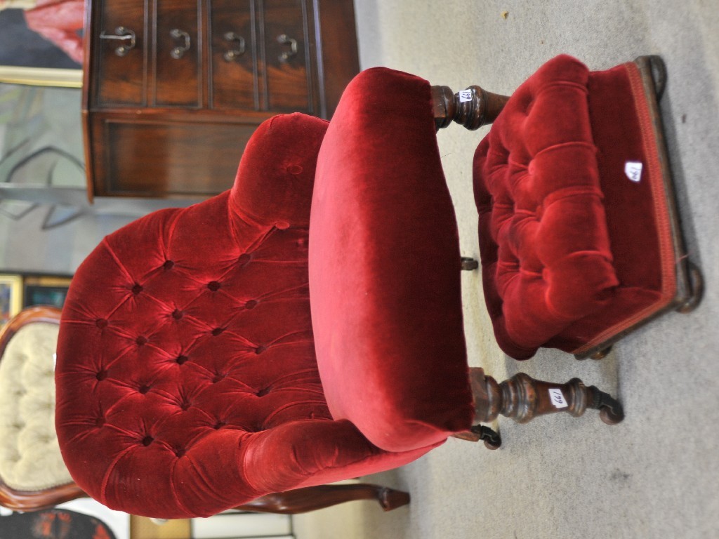 Appraisal: Victorian mahogany armchair and foot stool