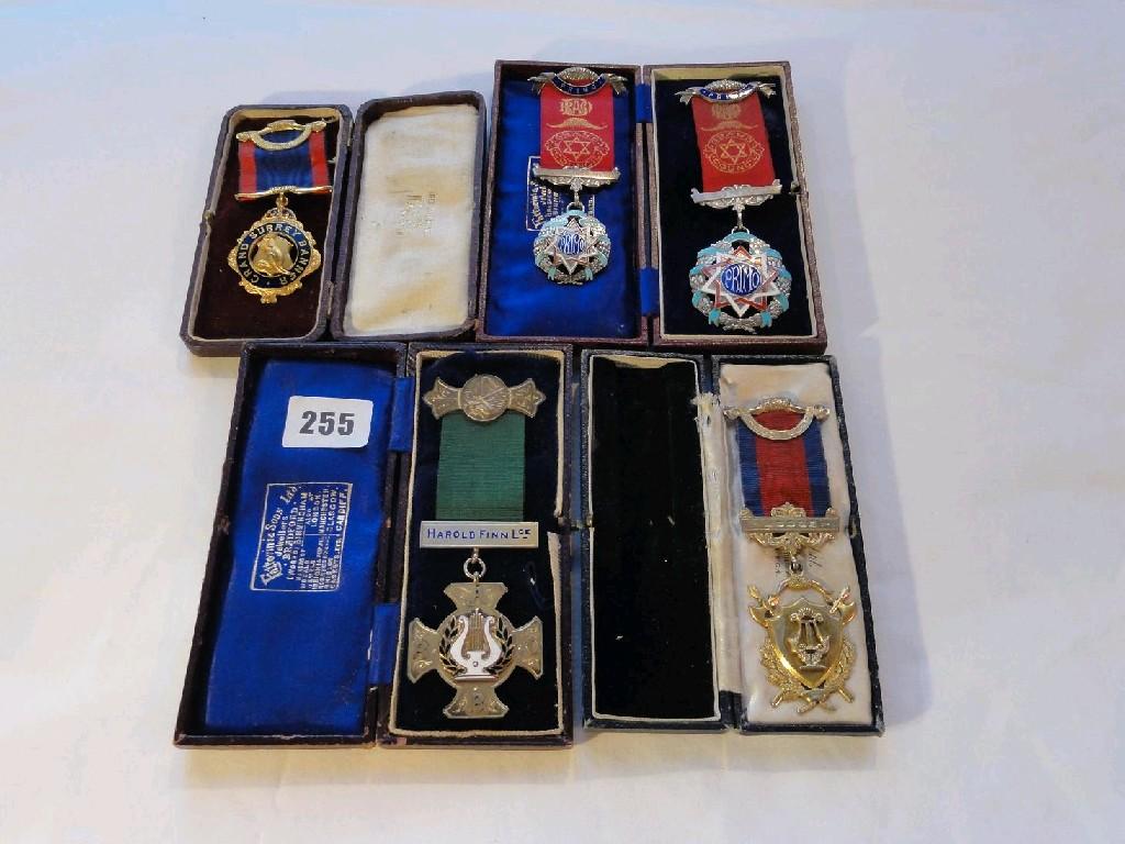 Appraisal: A collection of silver and other enamelled lodge badges etc