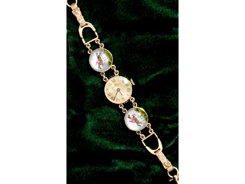 Appraisal: LADY'S WATCH WITH REVERSE CRYSTAL ELEMENTS k yellow gold lady's