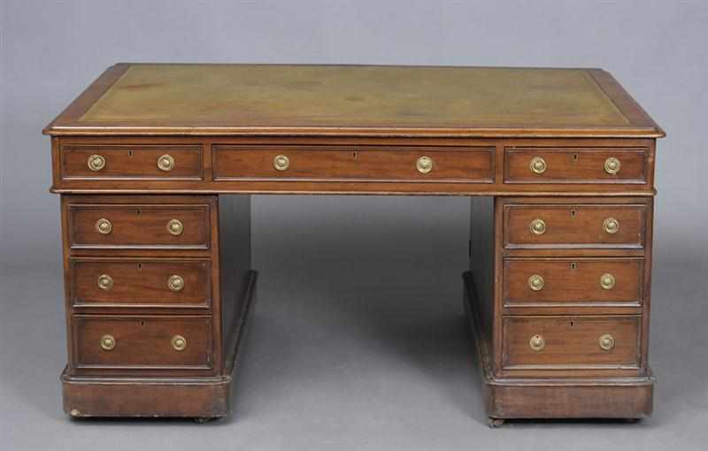 Appraisal: REGENCY STYLE MAHOGANY PARTNER'S DESK The top with gold-tooled green