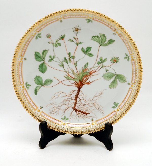 Appraisal: Flora Danica plate handpainted with flowers gilded sawtooth rim marked