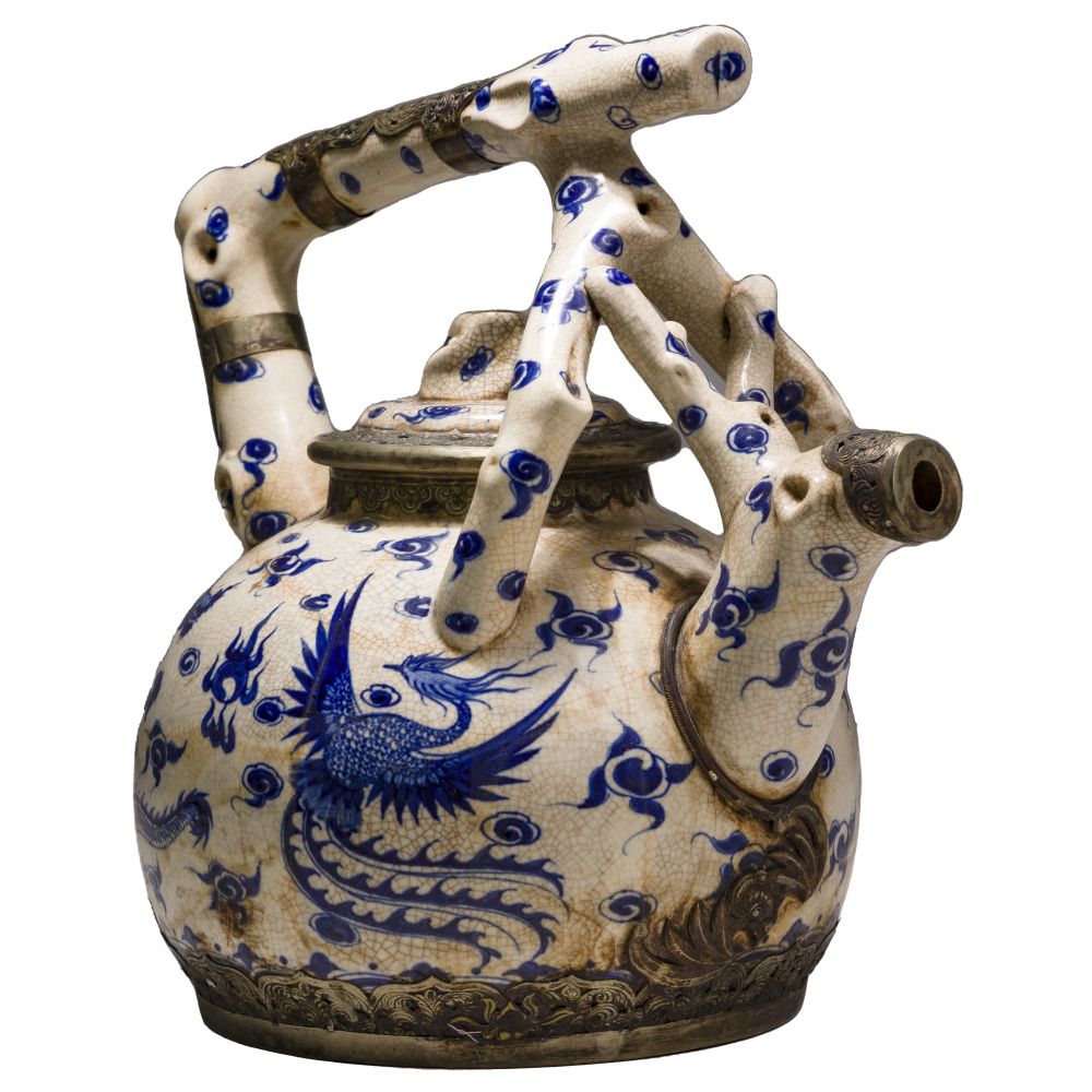 Appraisal: ASIAN STYLE PORCELAIN TEAPOTHaving crackled underglaze blue on white dragon