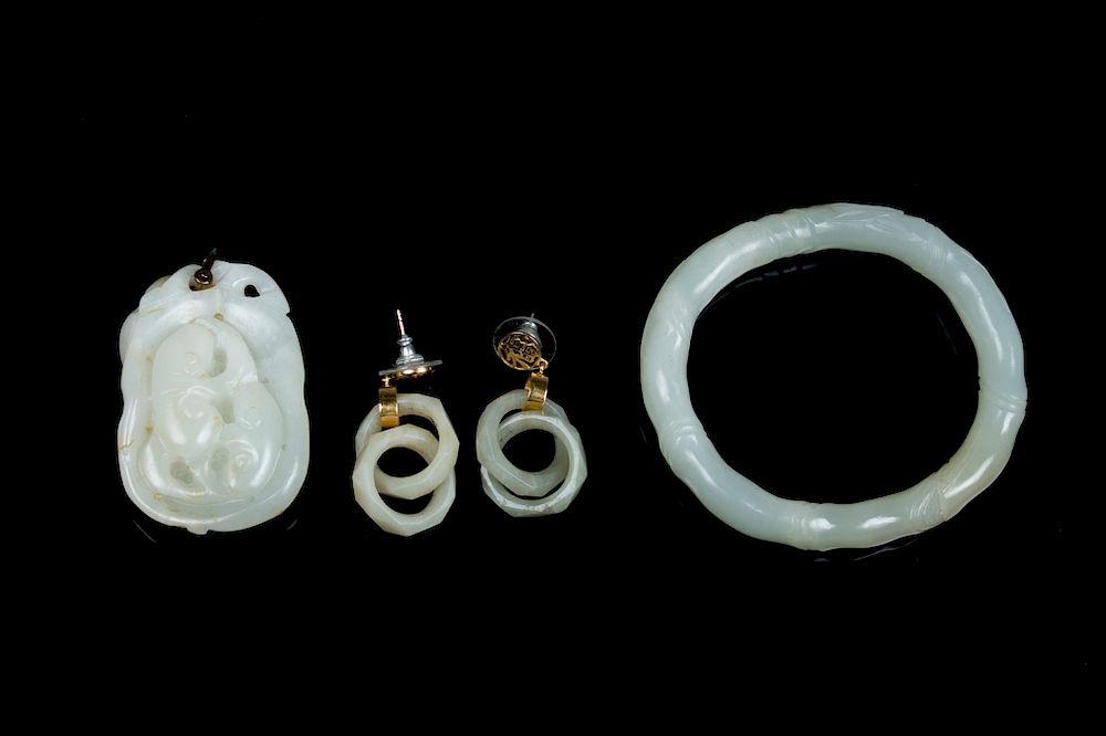 Appraisal: GROUP OF WHITE JADE ACCESSORIES TH C The group comprising