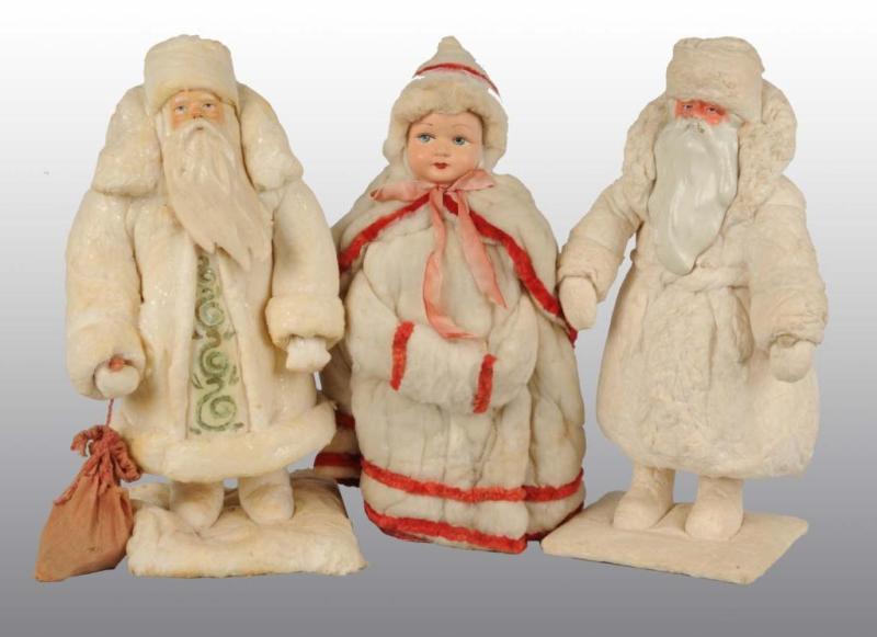 Appraisal: Lot of Cotton Christmas Santa Girl Dolls Description Includes one