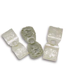 Appraisal: THREE JADE DOUBLE BUCKLES Group of three antique Chinese carved