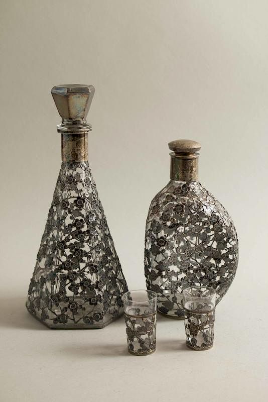 Appraisal: Two Glass Decanters Shot Glasses with Silver Overlay Two sterling