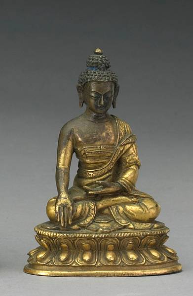 Appraisal: A Sino-Tibetan gilt bronze figure of a seated Buddha th