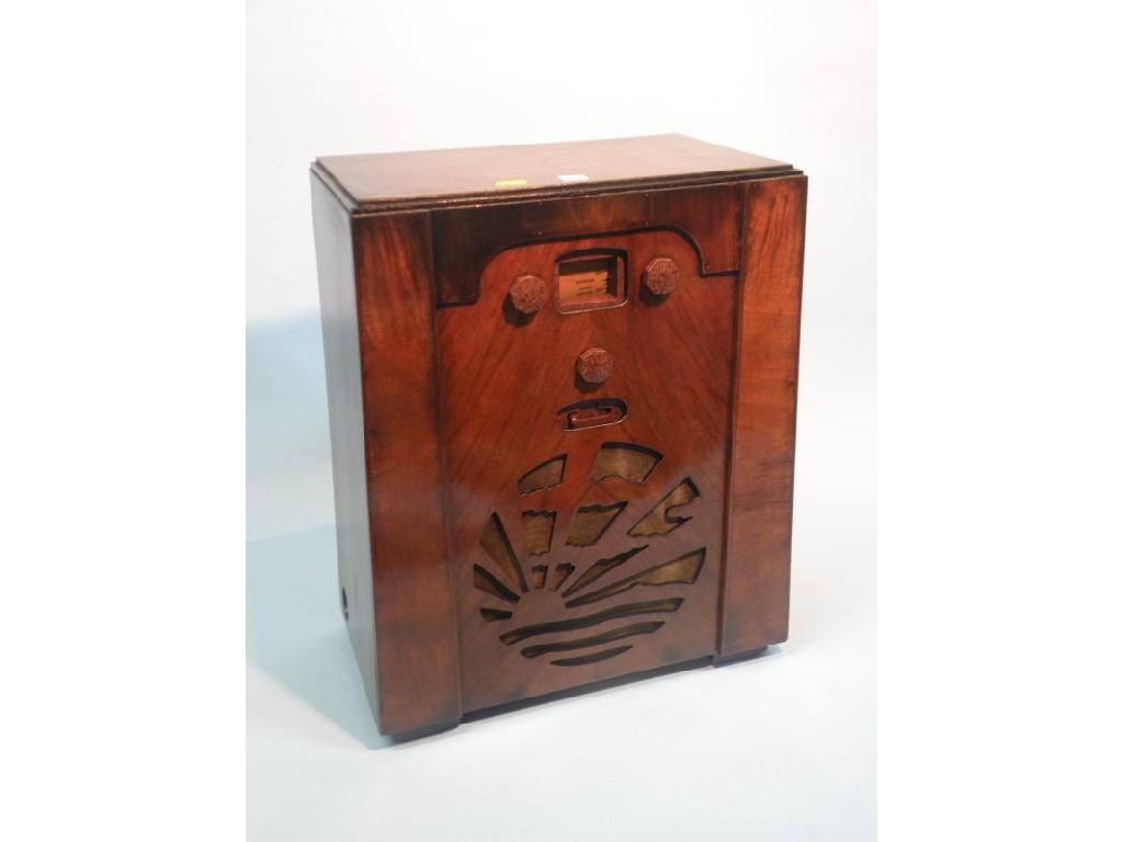 Appraisal: An Art Deco style radio in a walnut case with