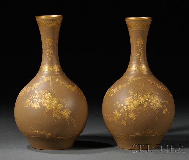 Appraisal: Pair of Wedgwood Gilded Stoneware Vases England c both bottle-shaped