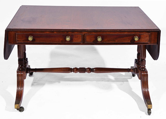 Appraisal: A TH CENTURY MAHOGANY SOFA TABLE with two short drawers