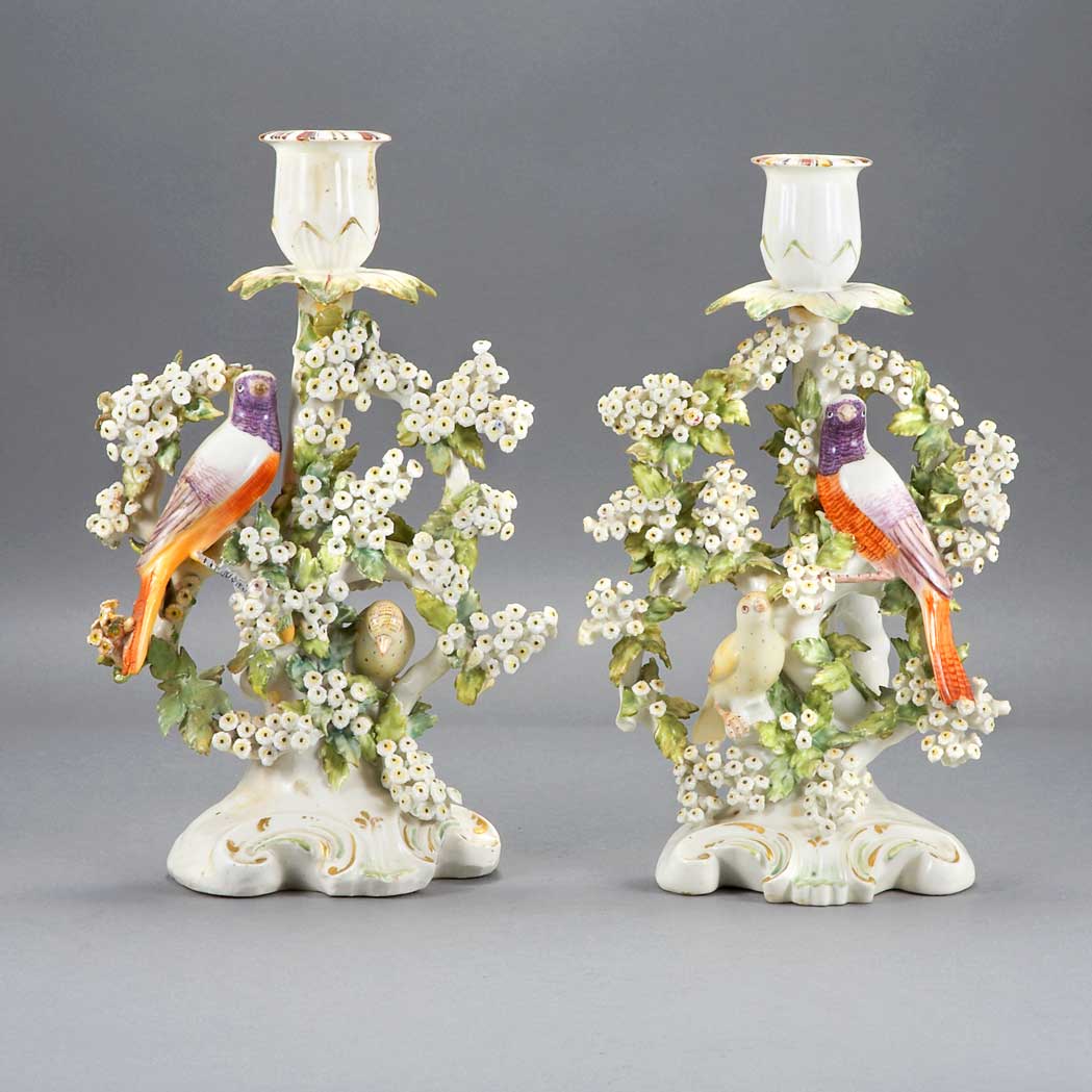 Appraisal: Pair of Continental Porcelain Candlesticks Each in the form of