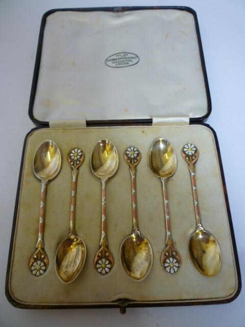 Appraisal: A SET OF SIX SILVER GILT AND ENAMEL COFFEE SPOONS