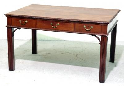 Appraisal: A MAHOGANY LIBRARY TABLE of Georgian design the oblong top