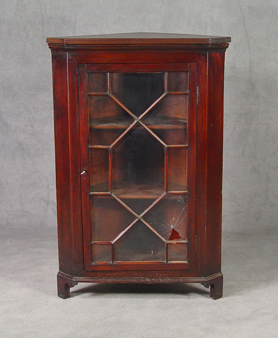 Appraisal: Miniature Mahogany Corner Cupboard th Century Thirteen pane glazed astragal