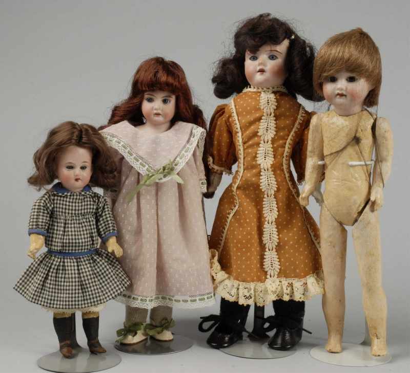 Appraisal: Lot of German Bisque Child Dolls Description Bisque shoulder head