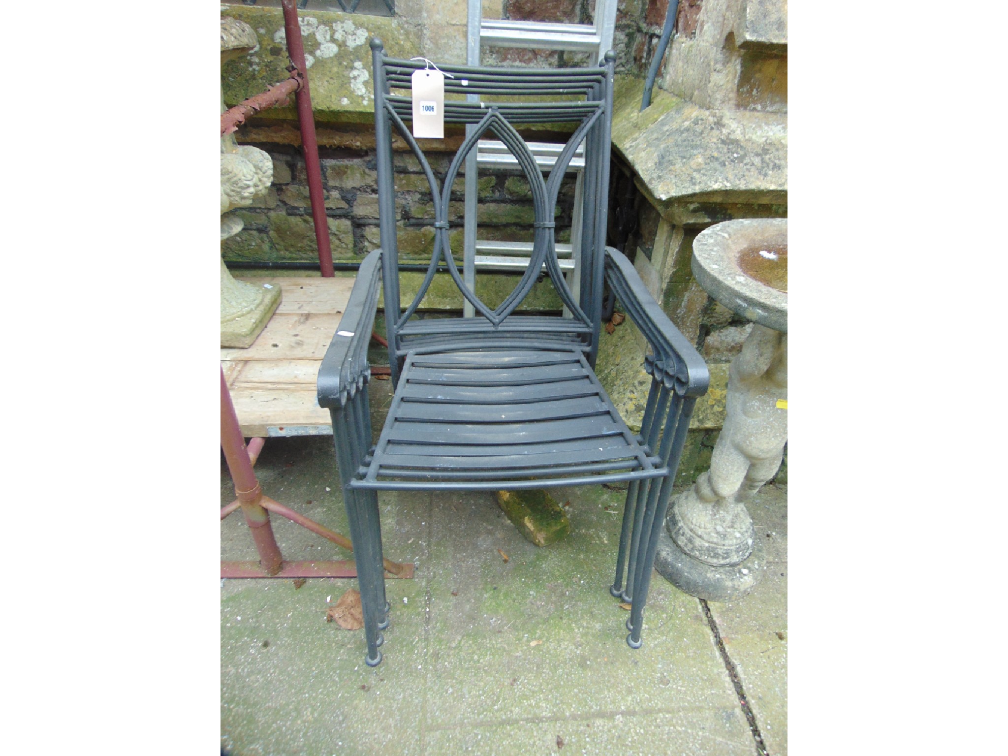 Appraisal: A set of four contemporary steel stacking garden conservatory chairs