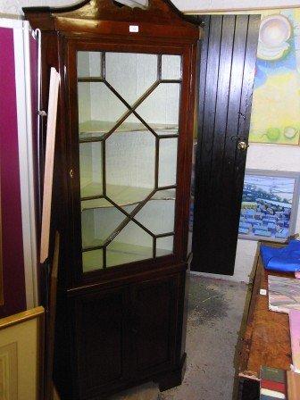 Appraisal: A TH CENTURY MAHOGANY AND INLAID CORNER CUPBOARD with glazed