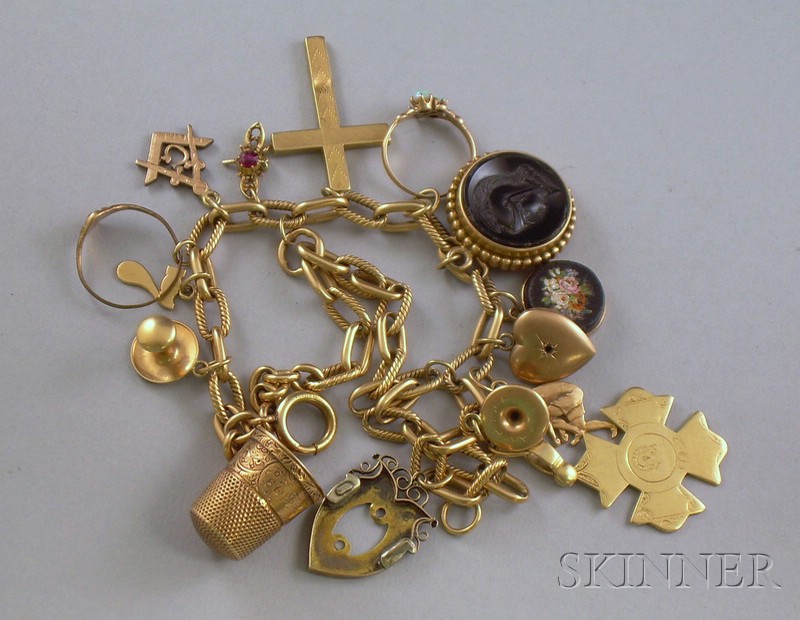 Appraisal: kt Gold Charm Bracelet with gold and gold-tone charms total