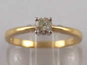 Appraisal: A carat gold diamond solitaire ring the round brilliant cut