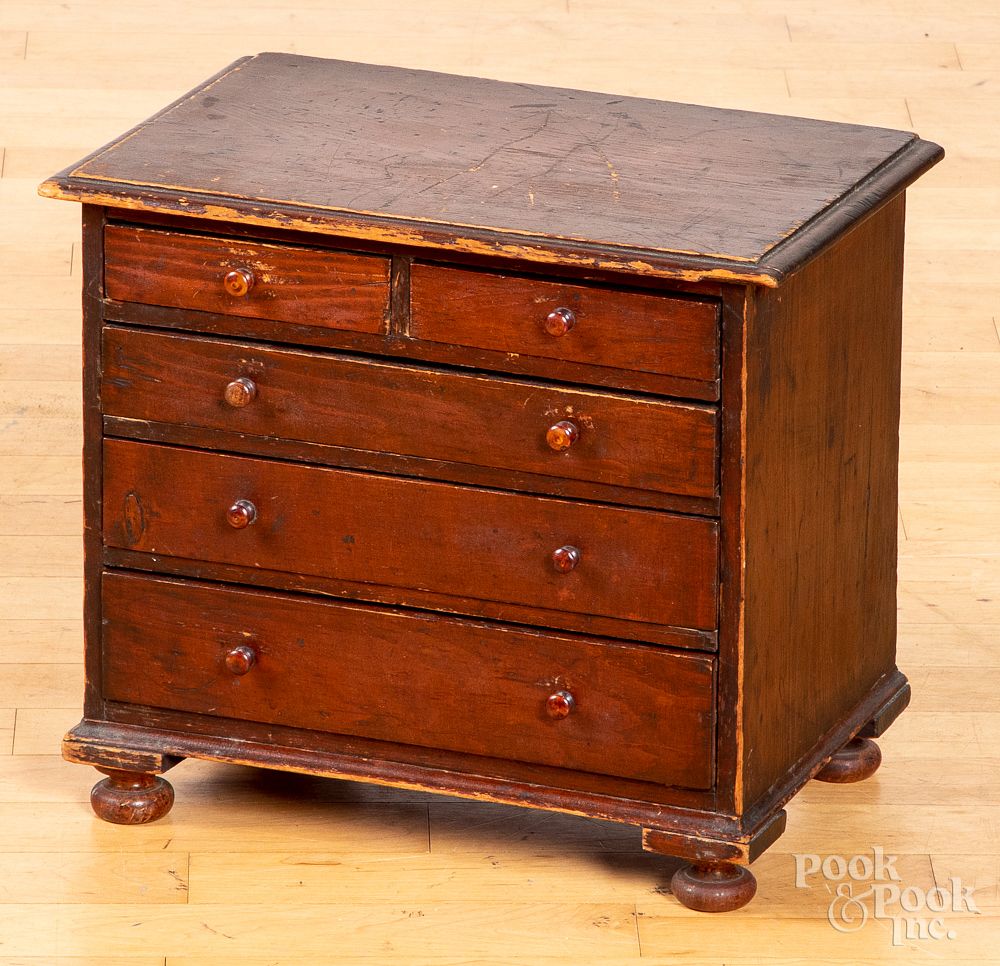 Appraisal: Miniature pine chest of drawers th c Miniature pine chest