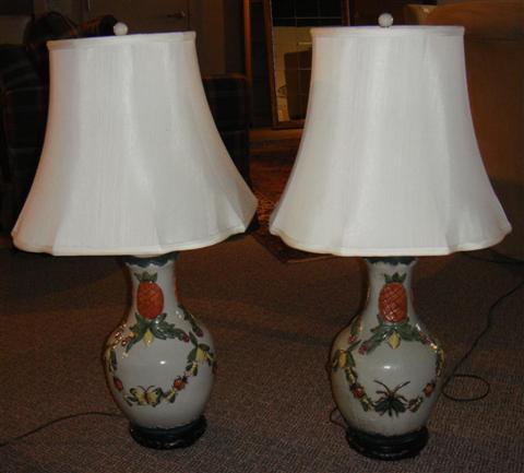 Appraisal: PAIR OF MOLDED LAMPS WITH FRUIT AND INSECTS h in