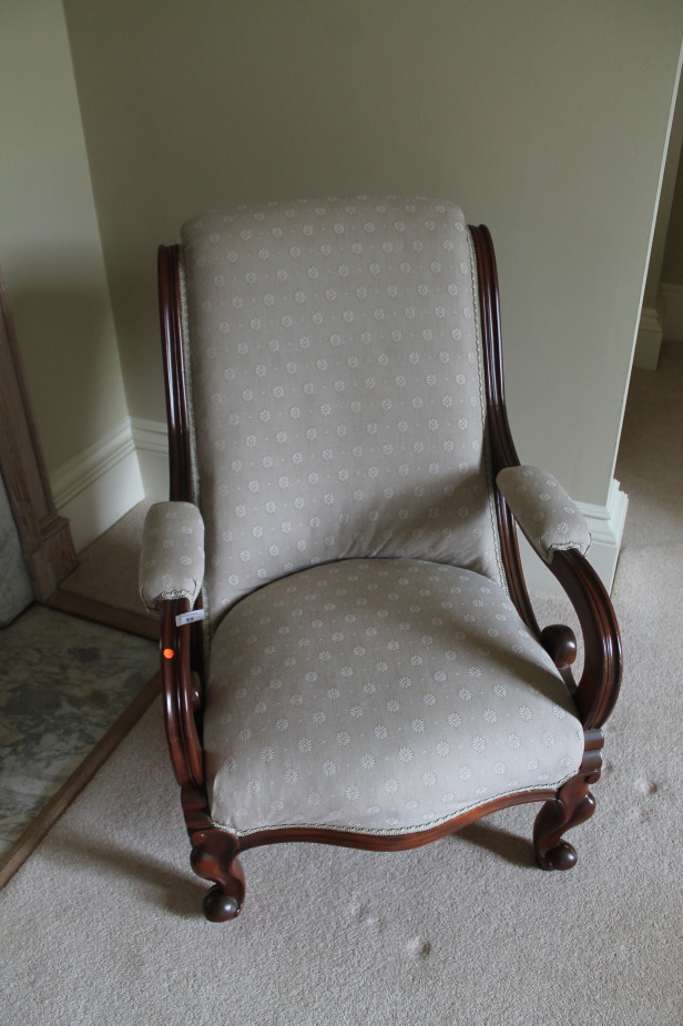 Appraisal: A William IV style mahogany library chair with scroll arms