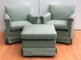 Appraisal: A pair of green fabric upholstered armchairs with ottoman