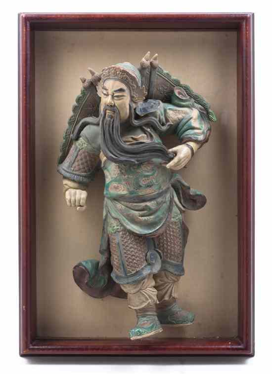 Appraisal: A Ming Style Ceramic Model of a General depicted standing