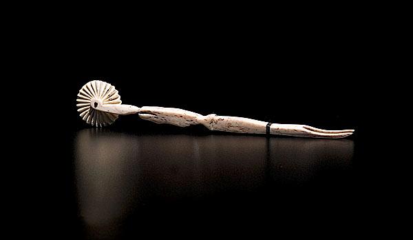 Appraisal: WHALE BONE AND IVORY JAGGING WHEEL American ca having a