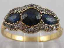 Appraisal: A yellow metal tests carat gold diamond and sapphire ring