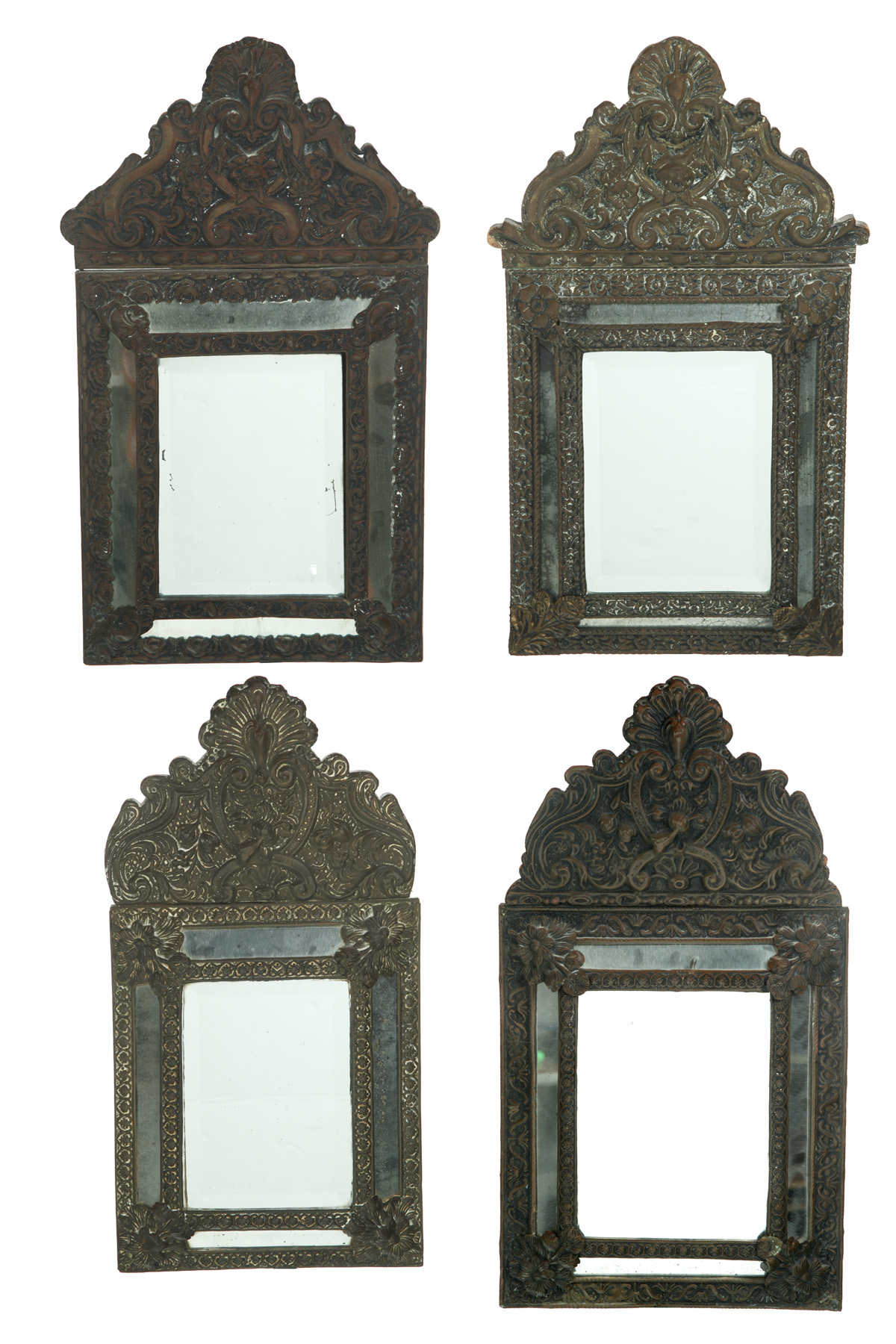 Appraisal: FOUR SIMILAR FLORENTINE-STYLE MIRRORS Twentieth century pressed tin All with