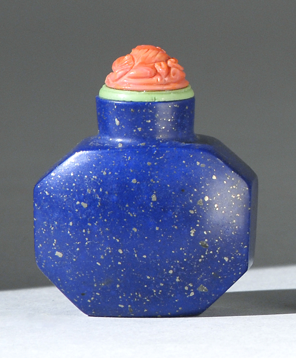 Appraisal: LAPIS LAZULI SNUFF BOTTLE th CenturyIn faceted ovoid form with