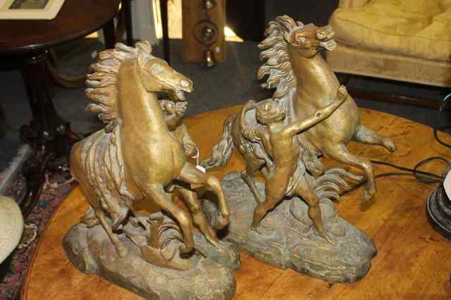 Appraisal: AFTER GUILLAUME COUSTEAU French - A pair of bronze models