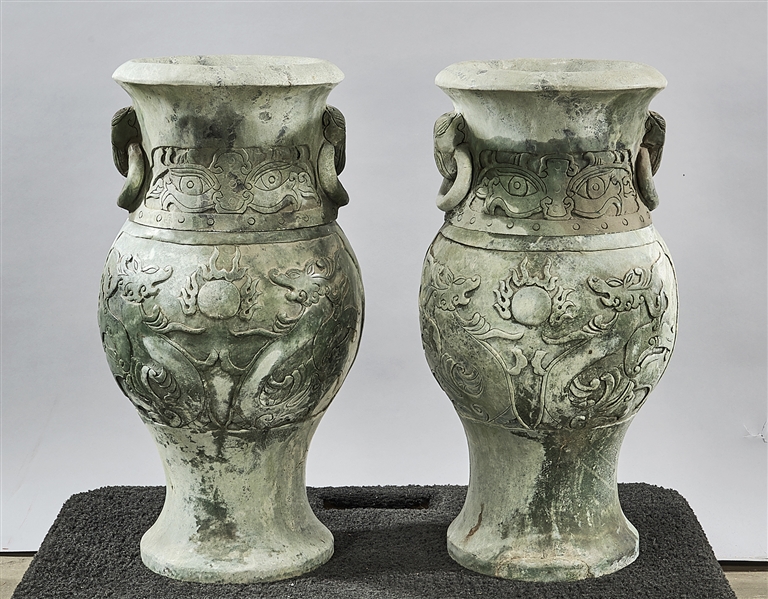 Appraisal: Pair of Chinese carved stone garden vases two sections to