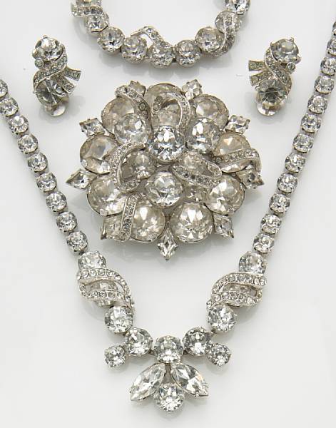 Appraisal: A collection of costume jewelry comprising a necklace brooch bracelet