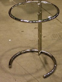 Appraisal: An Eileen Gray chromed tubular steel and glass topped side