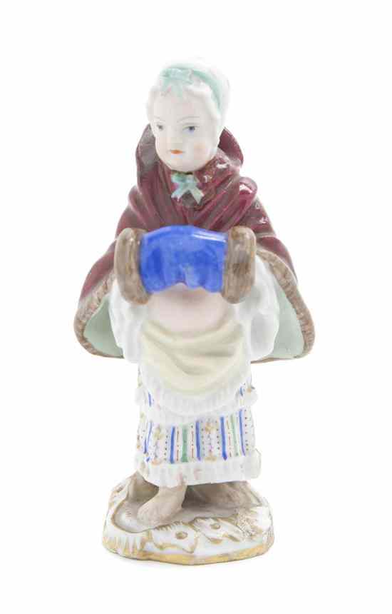 Appraisal: A Meissen Porcelain Figure depicting a standing girl with a