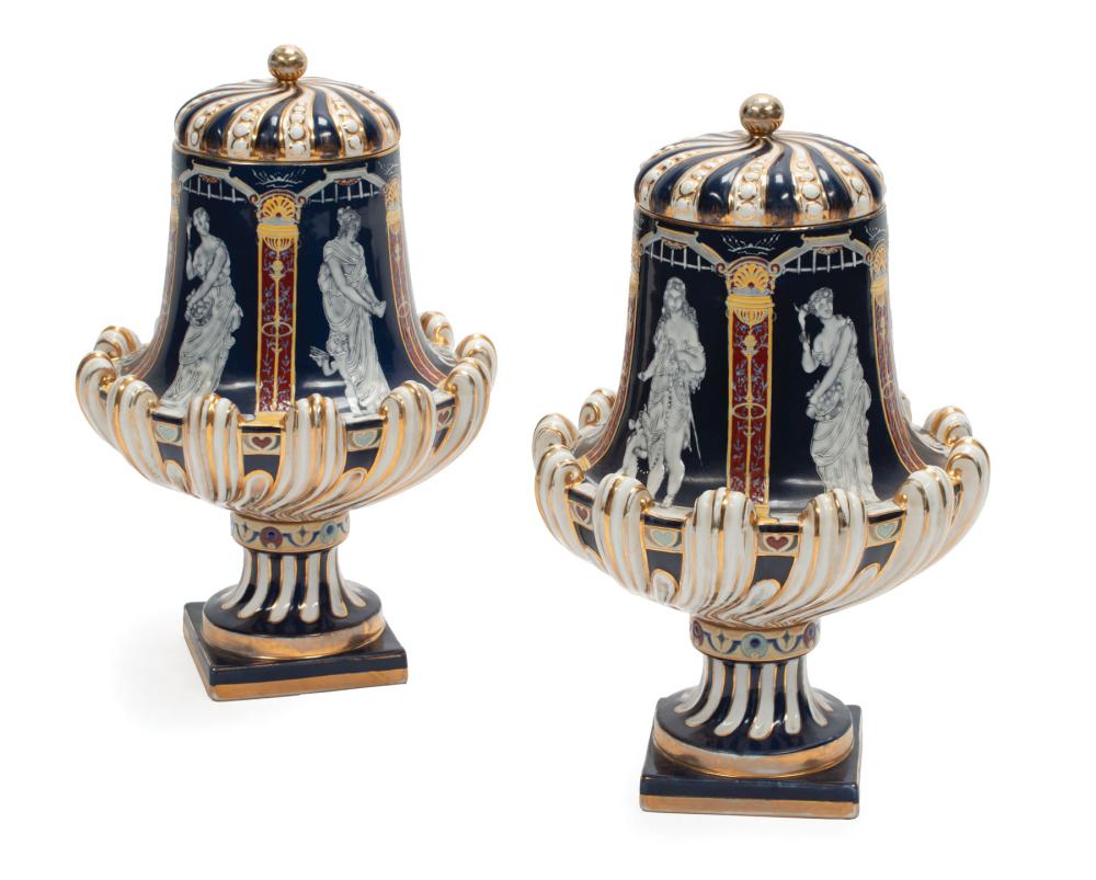 Appraisal: Pair of Minton-Style Polychrome and Gilt Porcelain Lidded Urns marked