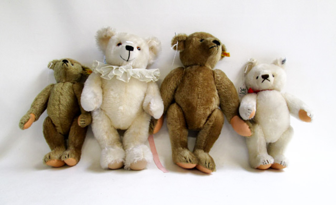 Appraisal: FOUR STEIFF MOHAIR BEARS each with metal ear tag Margaret