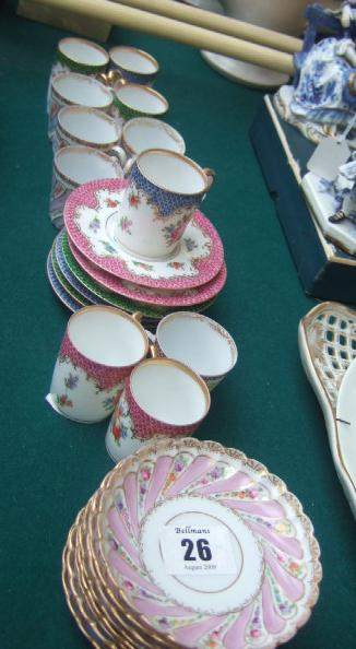 Appraisal: A quantity of miniature Dresden porcelain coffee cans and saucers