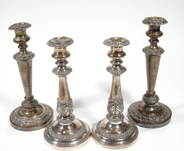 Appraisal: Two pairs of silver plated candle sticks one pair with