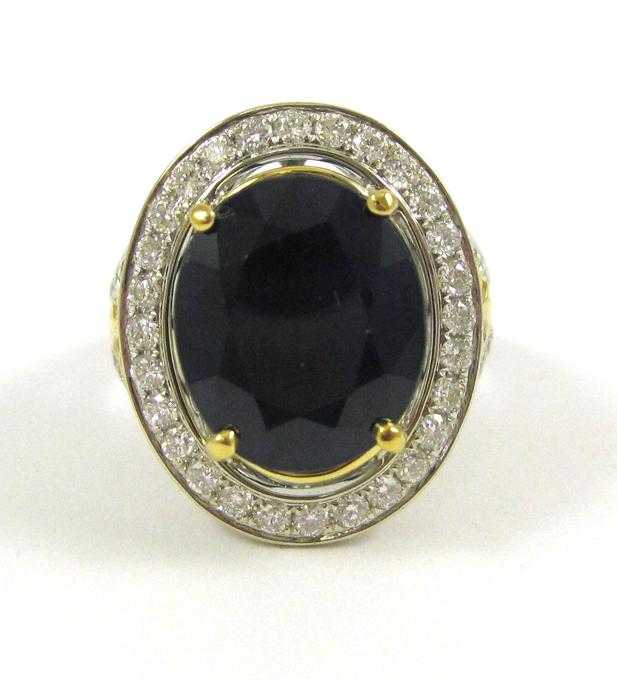 Appraisal: SAPPHIRE DIAMOND AND FOURTEEN KARAT GOLD RING The heavy white