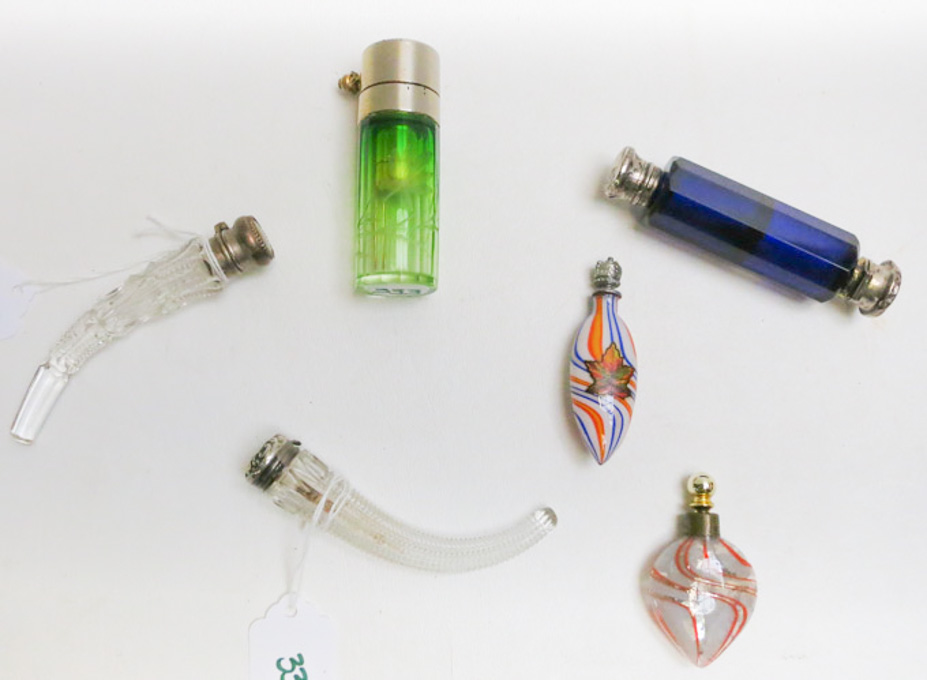 Appraisal: SIX GLASS FRAGRANCE BOTTLES including two cut crystal lay-down bottles