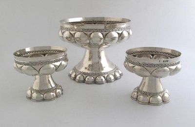 Appraisal: A suite of three Edward VII stem cups with lobed