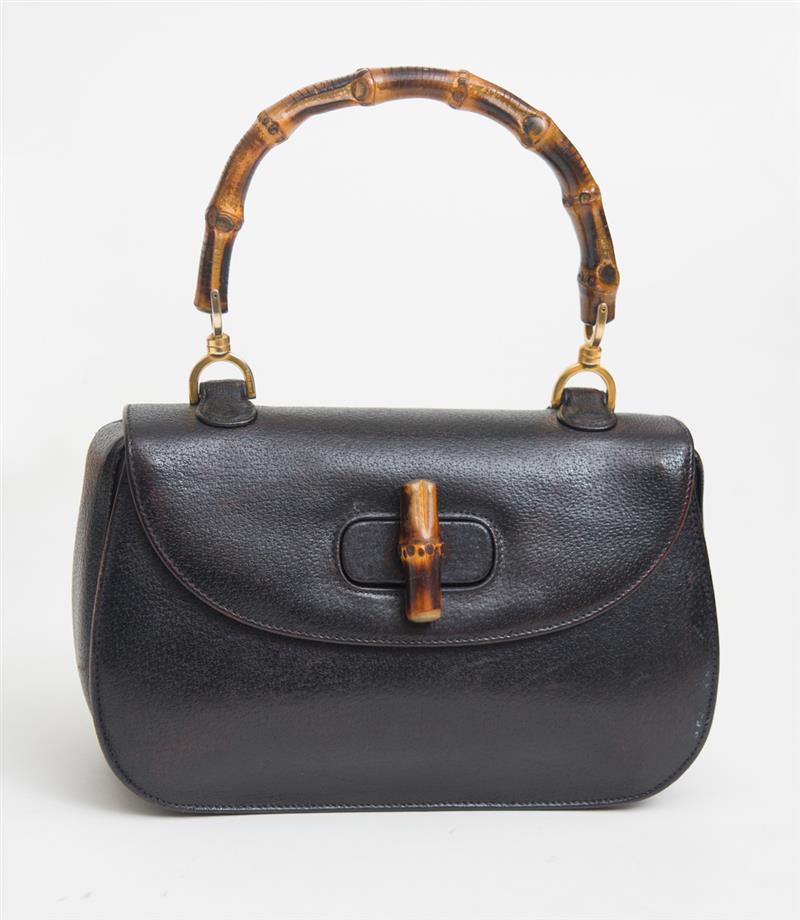 Appraisal: GUCCI DARK BROWN LEATHER HANDBAG WITH BAMBOO HANDLE Stamped 'Gucci