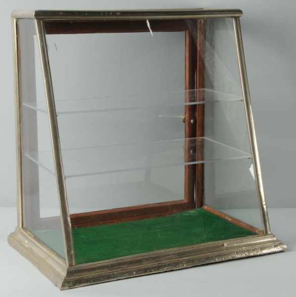 Appraisal: Glass Country Store Slant Front Display Case Description With chrome