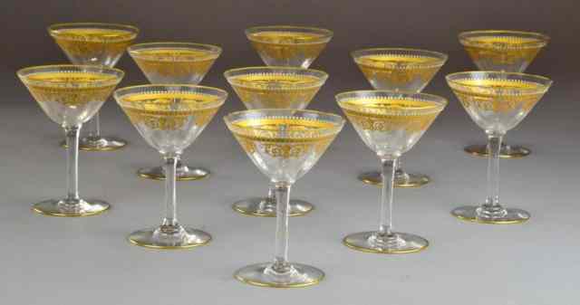 Appraisal: French Gilt Enameled Decorated Martini GlasEach with fluted basin finely