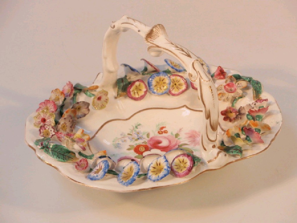 Appraisal: A Coalport oval basket the centre painted with a spray