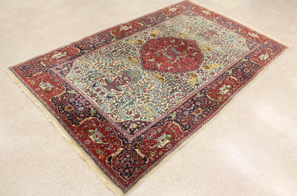 Appraisal: HAND KNOTTED ORIENTAL AREA RUG Pakistani Tabriz floral and central